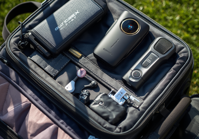 golf-tech-gadgets-for-travel-with-rangefinder-gps-watch-power-bank-and-golf-bag